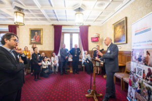 Vince Cable gives a speech in a room at the House of Lords