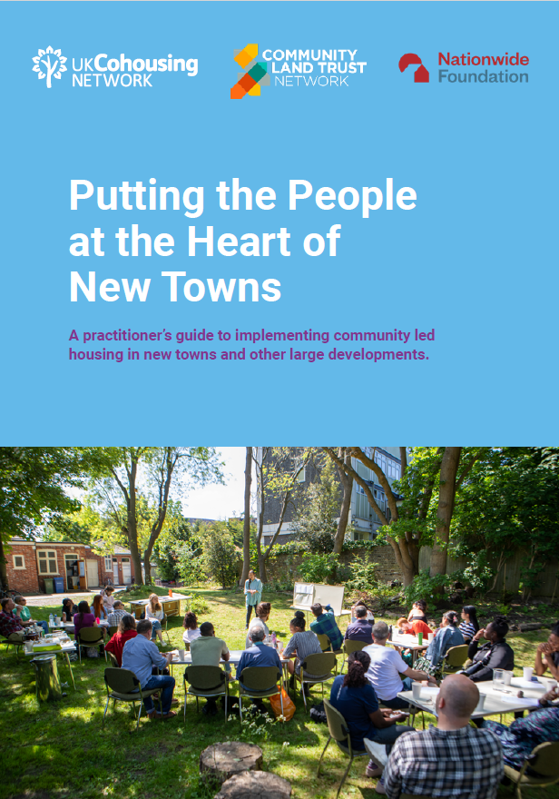 Front cover of a report. The top half is blue and the bottom half shows a photo of a number of people in a park on a sunny dayThe title of the report says 'Putting people at the heart of new towns'